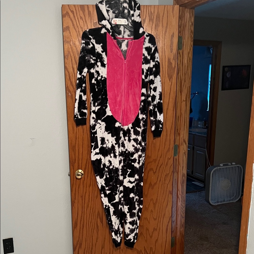 Black and White Cow Print Onesie with Pink Accent